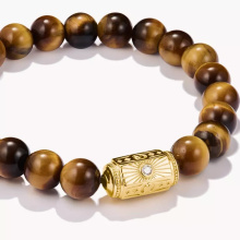 Thomas Sabo tigrisszem gyöngyös karkötő aranyozott dísszel