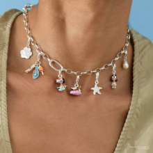 Thomas Sabo X Peanuts Snoopy és Woodstock az úszógumiban charm